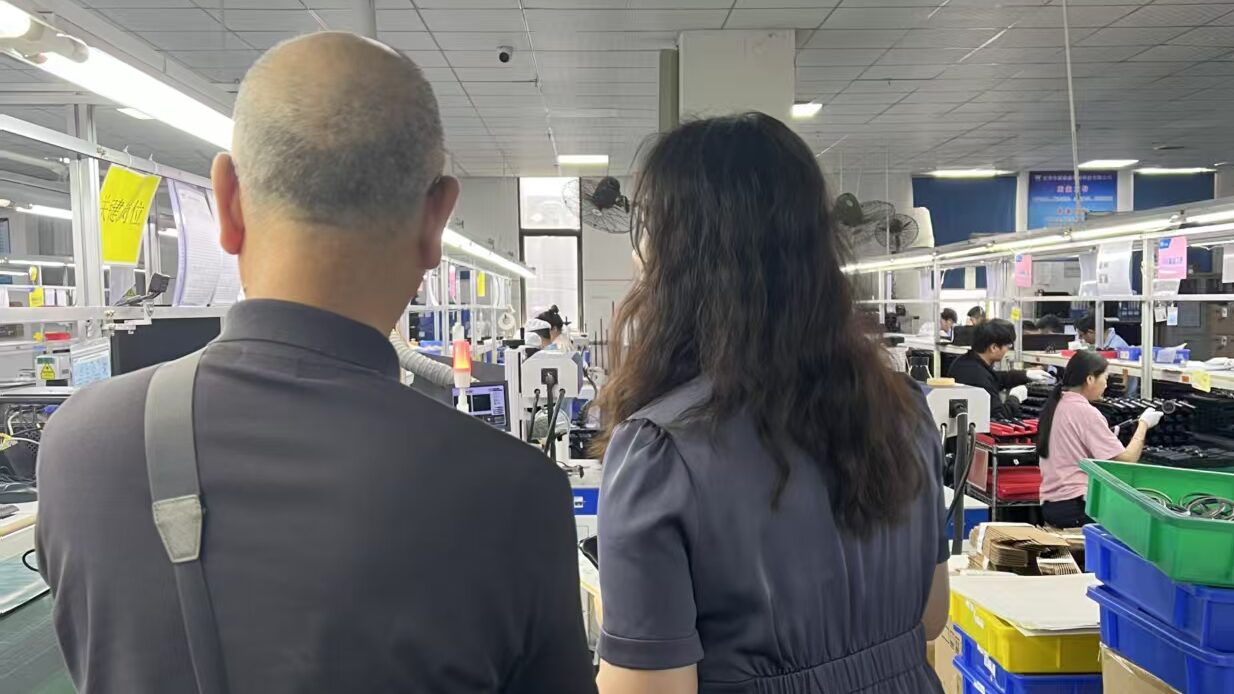 TongSourcing team visiting a supplier's assembly line in Shenzhen